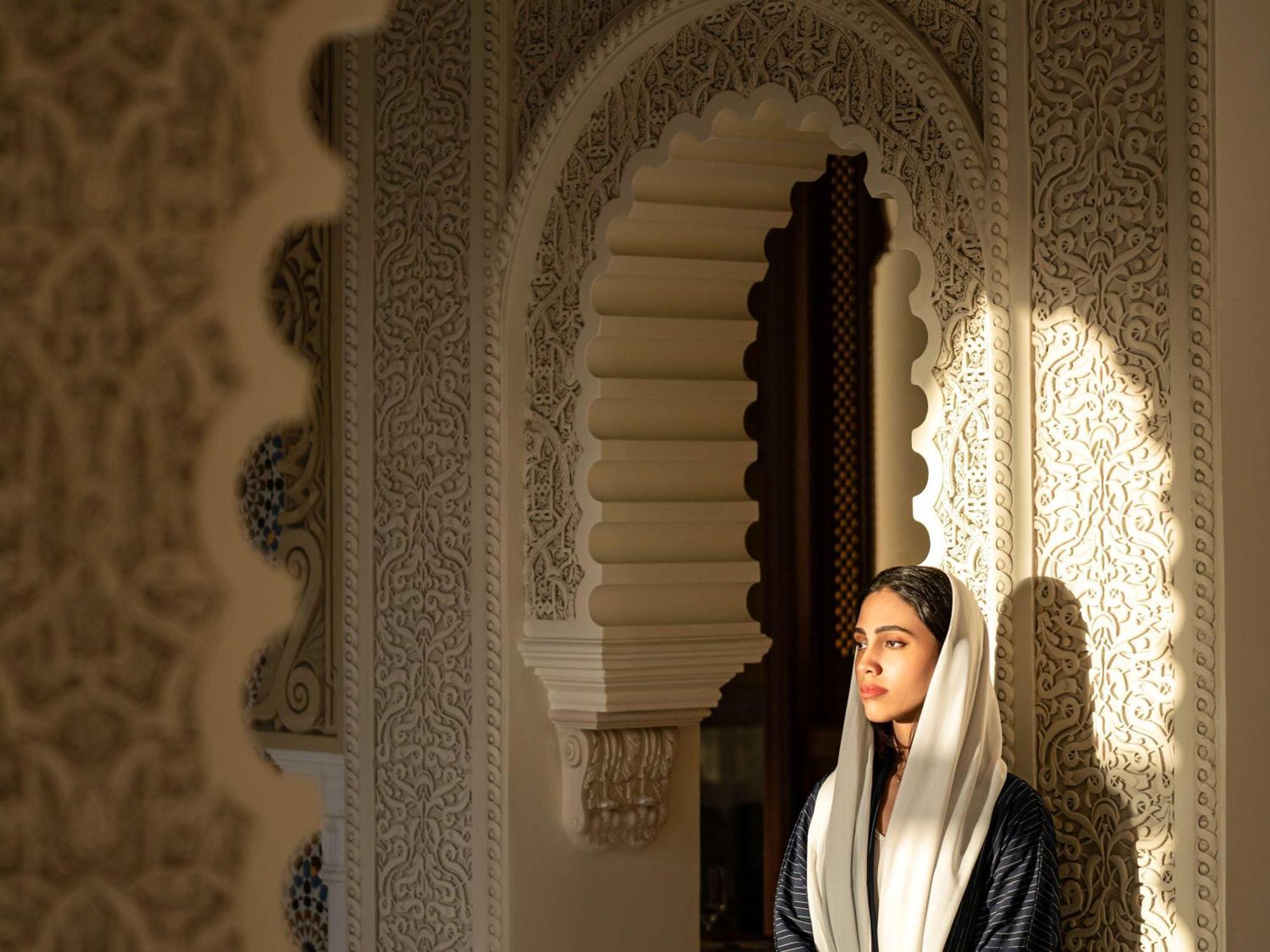 Movenpick Hotel And Residences Riyadh Exterior photo A Moroccan woman in traditional dress
